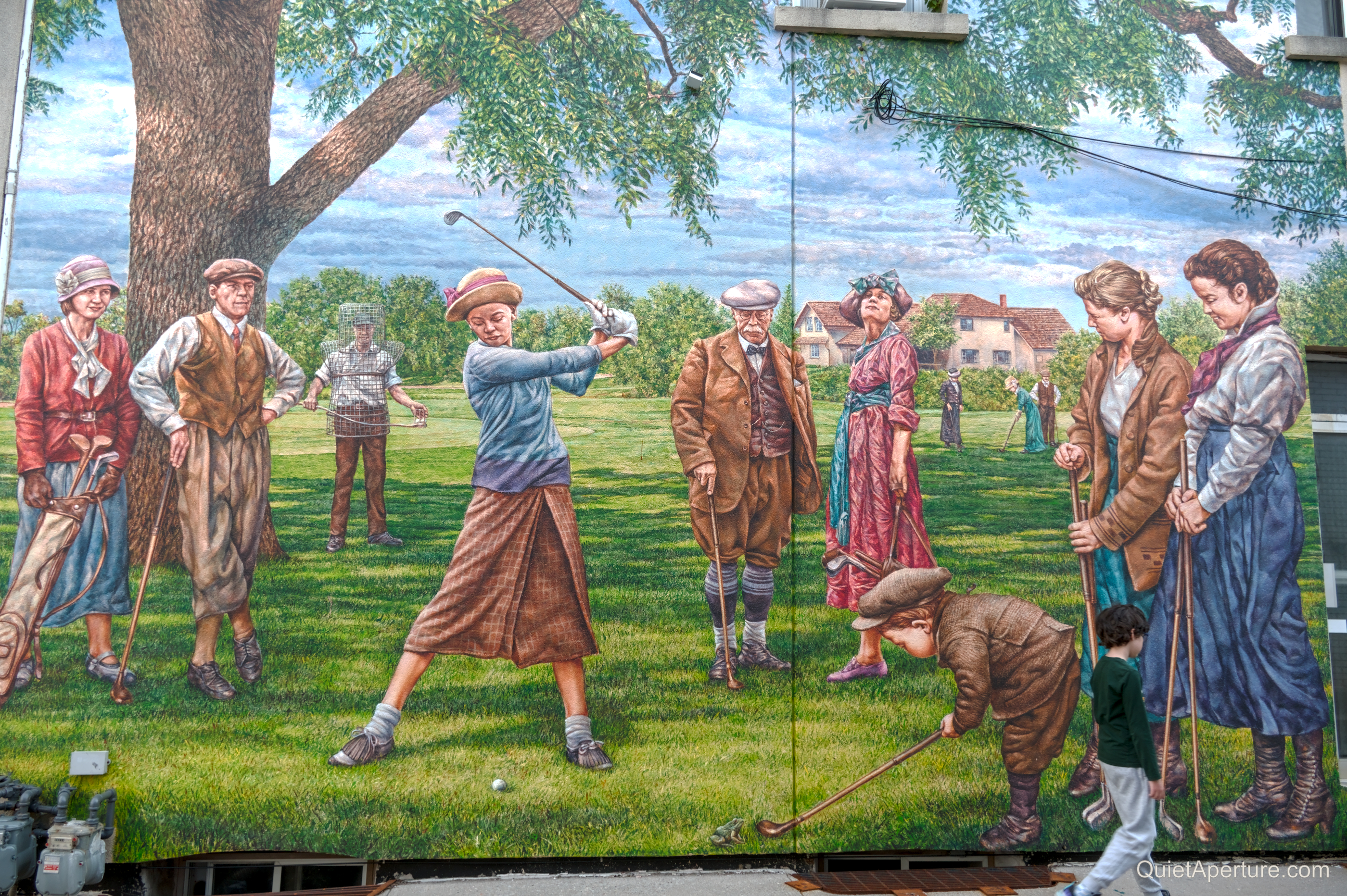 A colourful historical golf mural beneath a broad tree, frame 02.
